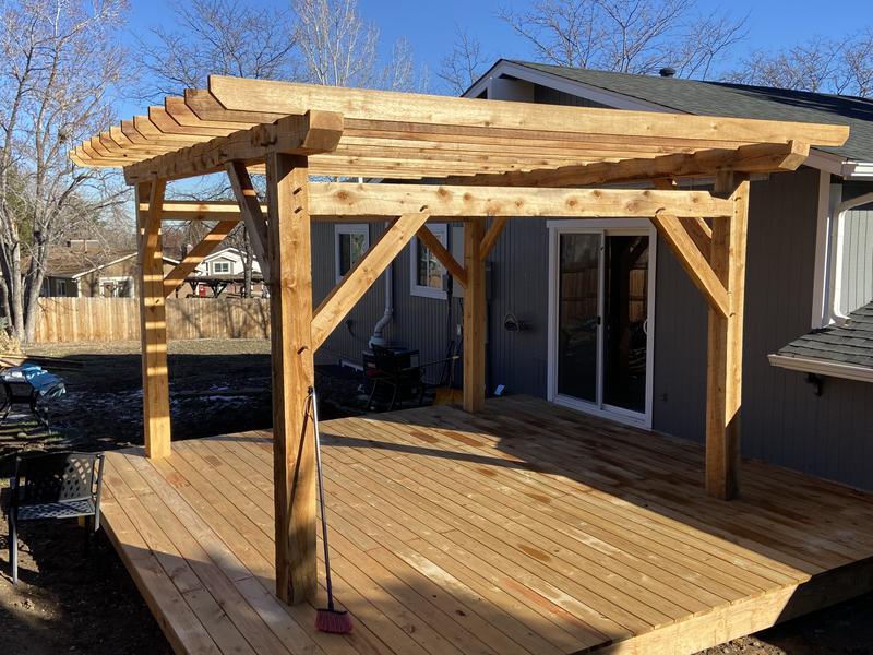 Completed timber frame pergola on cedar deck