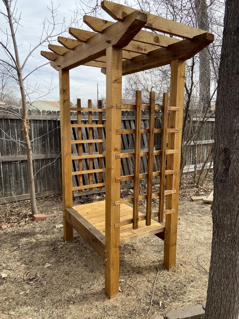 Cedar trellis with built-in bench seating